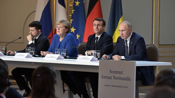 Predsednik Ukrajine Vladimir Zelenski, nemačka kancelarka Angela Merkel, predsednik Francuske Emanuel Makron i predsednik Rusije Vladimir Putin na zajedničkoj konferenciji za medije nakon samita Normandijske četvorke u Parizu - Sputnik Srbija