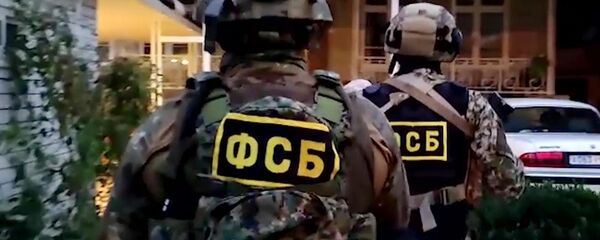 Припадници ФСБ током акције хапшења Припадници ФСБ током акције хапшења - Sputnik Србија