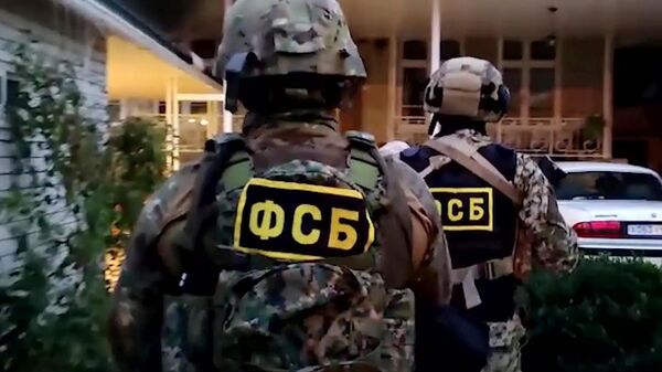 Припадници ФСБ током акције хапшења - Sputnik Србија