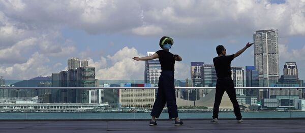 Вежбање у Хонгконгу под маскама Вежбање у Хонгконгу под маскама - Sputnik Србија