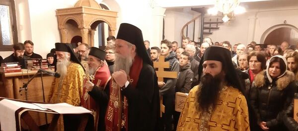 Episkop budimljansko-nikšićki Joanikije sa sveštenstvom služio je molebni kanon Presvetoj Bogorodici u Pljevljima Episkop budimljansko-nikšićki Joanikije sa sveštenstvom služio je molebni kanon Presvetoj Bogorodici u Pljevljima - Sputnik Srbija