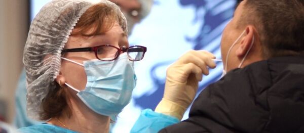 Санитарна контрола на аеродрому у Москви због коронавируса - Sputnik Србија