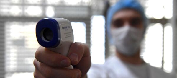 Мерење температуре – коронавирус Мерење температуре – коронавирус - Sputnik Србија