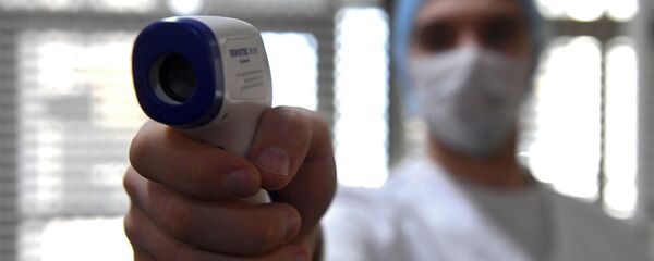 Мерење температуре – коронавирус - Sputnik Србија