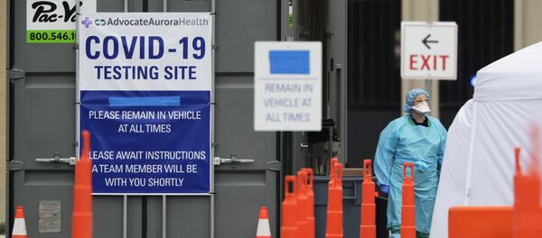 Лекари у Чикагу испред болнице у којој се спроводе тестови на коронавирус КОВИД-19 Лекари у Чикагу испред болнице у којој се спроводе тестови на коронавирус КОВИД-19 - Sputnik Србија