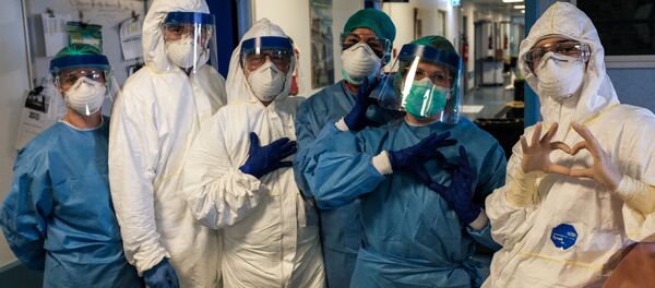 Медицинске сестре у заштитним оделома у болници Кремона, Италија - Sputnik Србија
