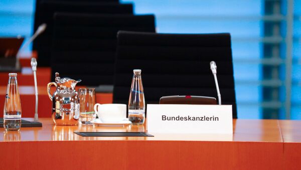 Празна столица немачке канцеларке Ангеле Меркел током редовног недељног састанка њеног кабинета - Sputnik Србија