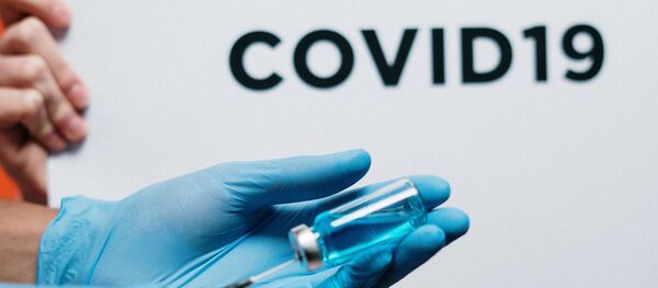 Вакцина против болести ковид 19 — илустрација - Sputnik Србија