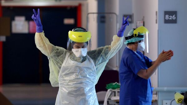 Медицинско особље у јединици за пацијенте оболеле од вируса корона у болници у Бриселу, Белгија. - Sputnik Србија