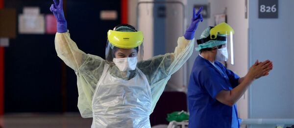 Медицинско особље у јединици за пацијенте оболеле од вируса корона у болници у Бриселу, Белгија. - Sputnik Србија