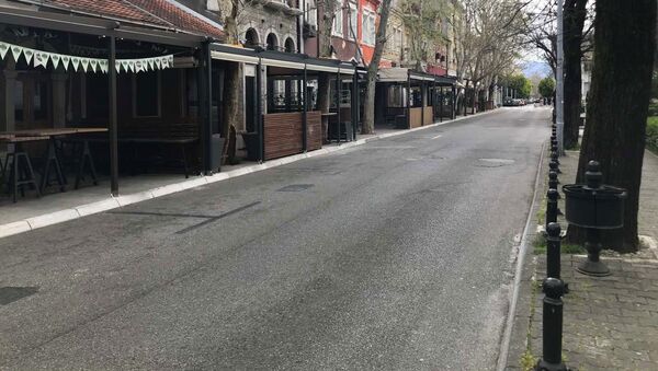 Пуста улица у Подгорици за време забране кретања - Sputnik Србија