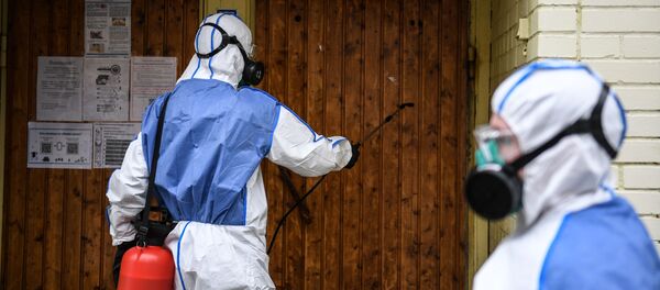 Dezinfekcija zgrade u Moskvi Dezinfekcija zgrade u Moskvi - Sputnik Srbija