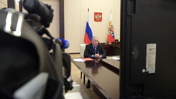 Председник Русије Владимир Путин на видео-седници Савета безбедности Русије - Sputnik Србија