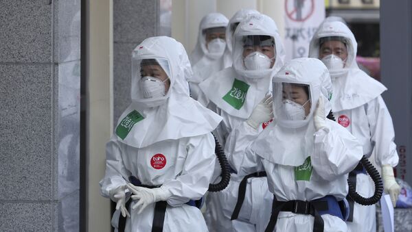 Medicinski radnici dolaze na posao u bolnicu u Daegu u Južnoj Koreji - Sputnik Srbija