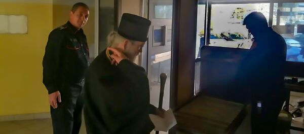 Митрополити Амфилохије у станици полиције у Подгорици Митрополити Амфилохије у станици полиције у Подгорици - Sputnik Србија