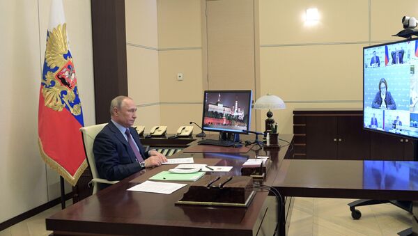 Председник Русије Владимир Путин током онлајн састанка у председничкој резиденцији  - Sputnik Србија