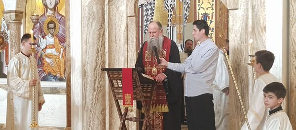 Владика Јоаникије на молебану у саборном храму у Подгорици. Владика Јоаникије на молебану у саборном храму у Подгорици. - Sputnik Србија