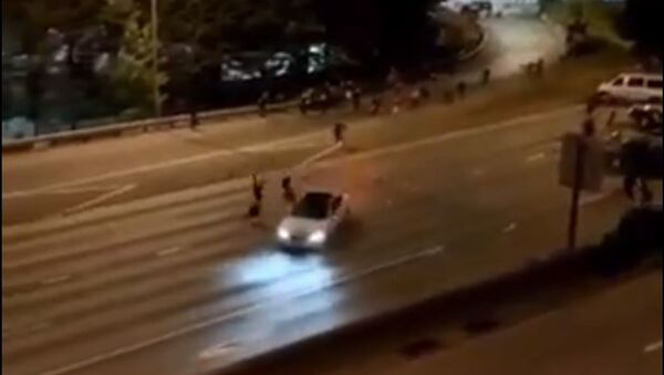 Аутомобил удара демонстранте на антирасистичким протестима у Сијетлу, САД - Sputnik Србија
