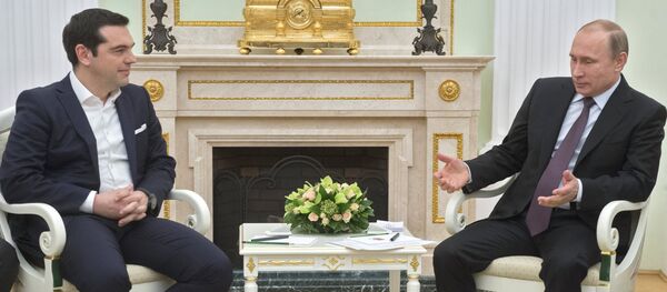 Руски председник Владимир Путин и грчки премијер Алексис Ципрас - Sputnik Србија