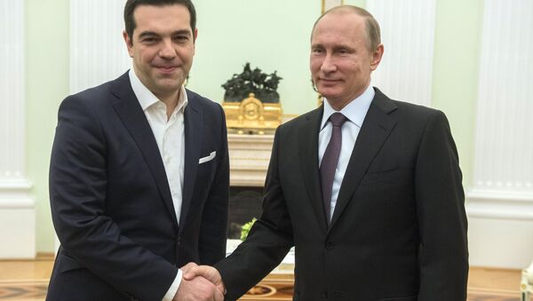 Руски председник Владимир Путин и грчки премијер Алексис Ципрас - Sputnik Србија