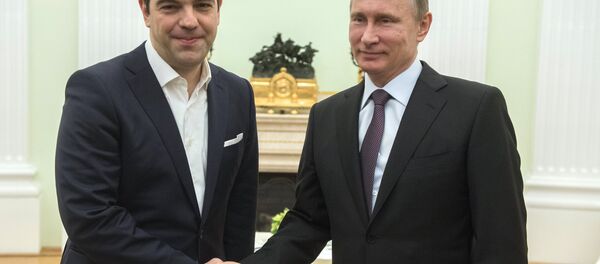 Руски председник Владимир Путин и грчки премијер Алексис Ципрас - Sputnik Србија