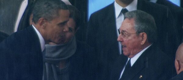 Predsednik SAD Barak Obama i predsednik Kube Raul Kastro Predsednik SAD Barak Obama i predsednik Kube Raul Kastro - Sputnik Srbija