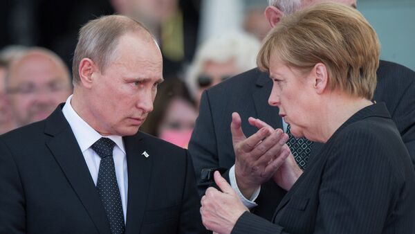 Владимир Путин и Ангела Меркел - Sputnik Србија