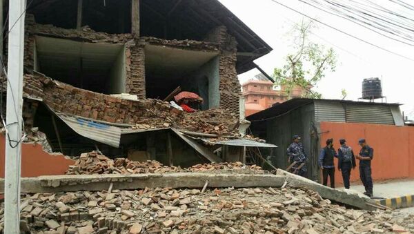 Collapsed building is seen in Nepal's capital Kathmandu - Sputnik Србија