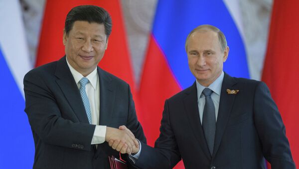Председник Русије Владимир Путин и кинески председник Си Ђинпинг - Sputnik Србија