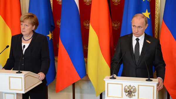 Zajednička pres-konferencija Vladimira Putina i Angele Merkel u Moskvi - Sputnik Srbija