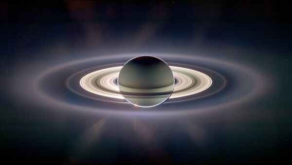 Saturn pomračuje Sunce, pogled sa položaja svemirske letilice Kasini-Hajgens - Sputnik Srbija