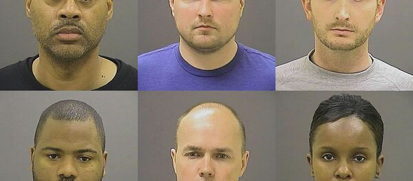 These undated photos provided by the Baltimore Police Department, show Baltimore police officers, top row from left, Caesar R. Goodson Jr., Garrett E. Miller and Edward M. Nero, and bottom row from left, William G. Porter, Brian W. Rice and Alicia D. White, charged with felonies ranging from assault to murder in the police-custody death of Freddie Gray. A grand jury indicted the six officers, State's Attorney Marilyn Mosby said Thursday, May 21, 2015. These undated photos provided by the Baltimore Police Department, show Baltimore police officers, top row from left, Caesar R. Goodson Jr., Garrett E. Miller and Edward M. Nero, and bottom row from left, William G. Porter, Brian W. Rice and Alicia D. White, charged with felonies ranging from assault to murder in the police-custody death of Freddie Gray. A grand jury indicted the six officers, State's Attorney Marilyn Mosby said Thursday, May 21, 2015. - Sputnik Srbija