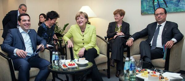 Angela Merkel i Aleksis Cipras Angela Merkel i Aleksis Cipras - Sputnik Srbija