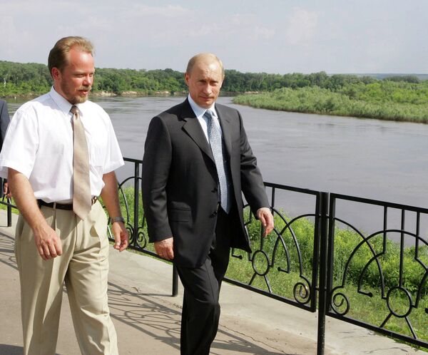 Руски председник Владимир Путин и унук познатог писца Александар Шолохов - Sputnik Србија