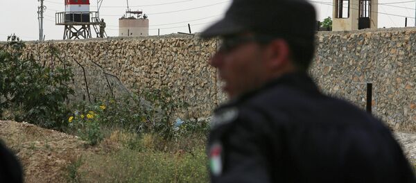 Египатски полицајац испред затвора - Sputnik Србија