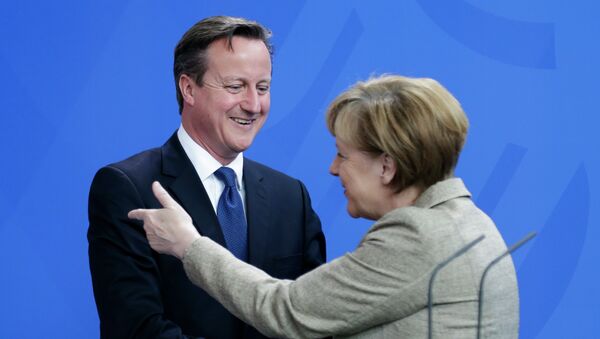 Angela Merkel i Dejvid Kameron - Sputnik Srbija