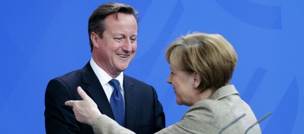 Ангела Меркел и Дејвид Камерон - Sputnik Србија