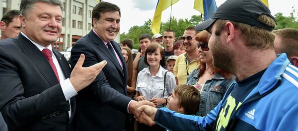 Председник Украјине Петро Порошенко и Михаил Сакашвили Председник Украјине Петро Порошенко и Михаил Сакашвили - Sputnik Србија