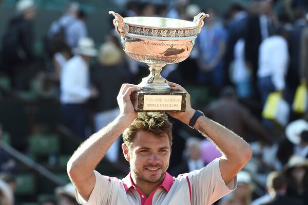 Stanislas Vavrinka sa trofejem Rolan Garosa Stanislas Vavrinka sa trofejem Rolan Garosa - Sputnik Srbija