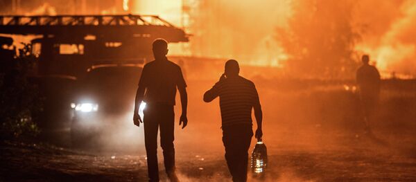 Пожар складишта нафте на периферији Кијева, Украјина Пожар складишта нафте на периферији Кијева, Украјина - Sputnik Србија