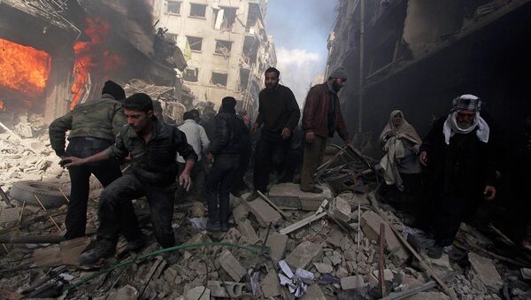 People walk on rubble as others try to put out a fire after what activists said were airstrikes followed by shelling by forces loyal to Syria's President Bashar al-Assad in the Douma neighborhood of Damascus, February 9, 2015. - Sputnik Србија