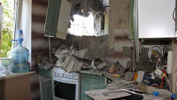 Доњецк, бомбардована кућа - Sputnik Србија