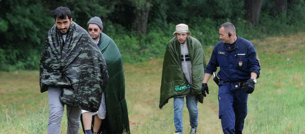 Migranti u Mađarskoj Migranti u Mađarskoj - Sputnik Srbija
