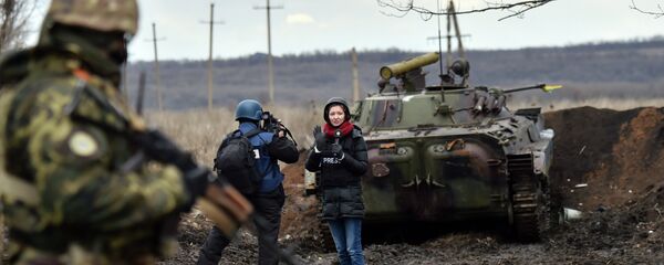 Новинари у рату Новинари у рату - Sputnik Србија