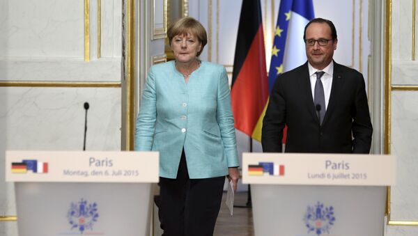 Angela Merkel i Fransoa Oland - Sputnik Srbija