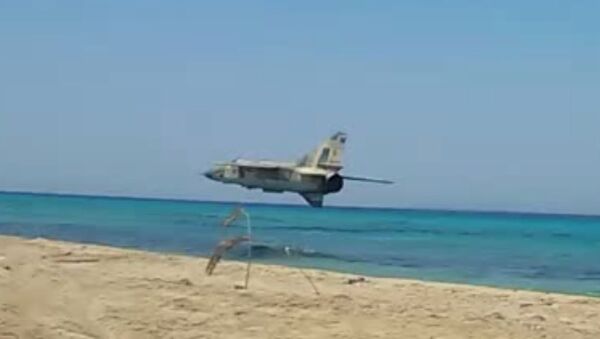 Libya FLAF Mig 23ML insane low pass over the beach - Sputnik Србија