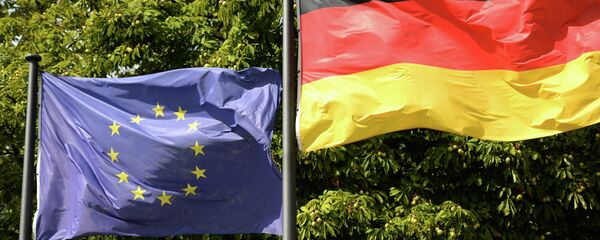 Zastave EU i Nemačke u Berlinu Zastave EU i Nemačke u Berlinu - Sputnik Srbija