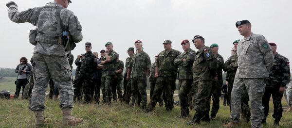 Vojnici NATO-a tokom vojne vežbe Vojnici NATO-a tokom vojne vežbe - Sputnik Srbija