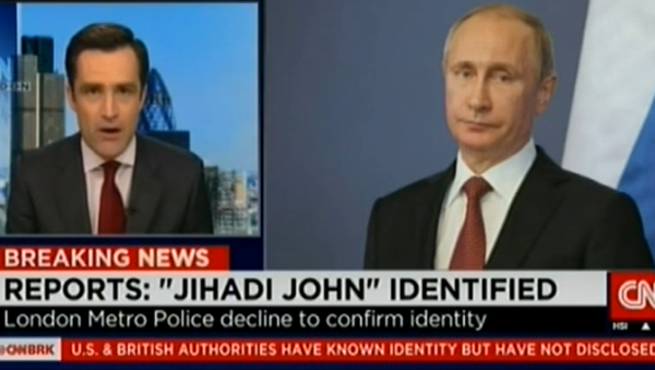 Skrinšot videa Si-En-En gde je umesto Džihadi Džona stavljena slika Putina - Sputnik Srbija