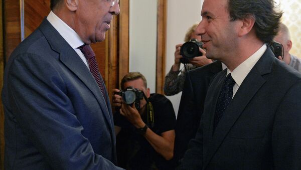 Sergej Lavrov i lider sirijske opozicione Nacionalne koalicije Haled Hodžaj - Sputnik Srbija